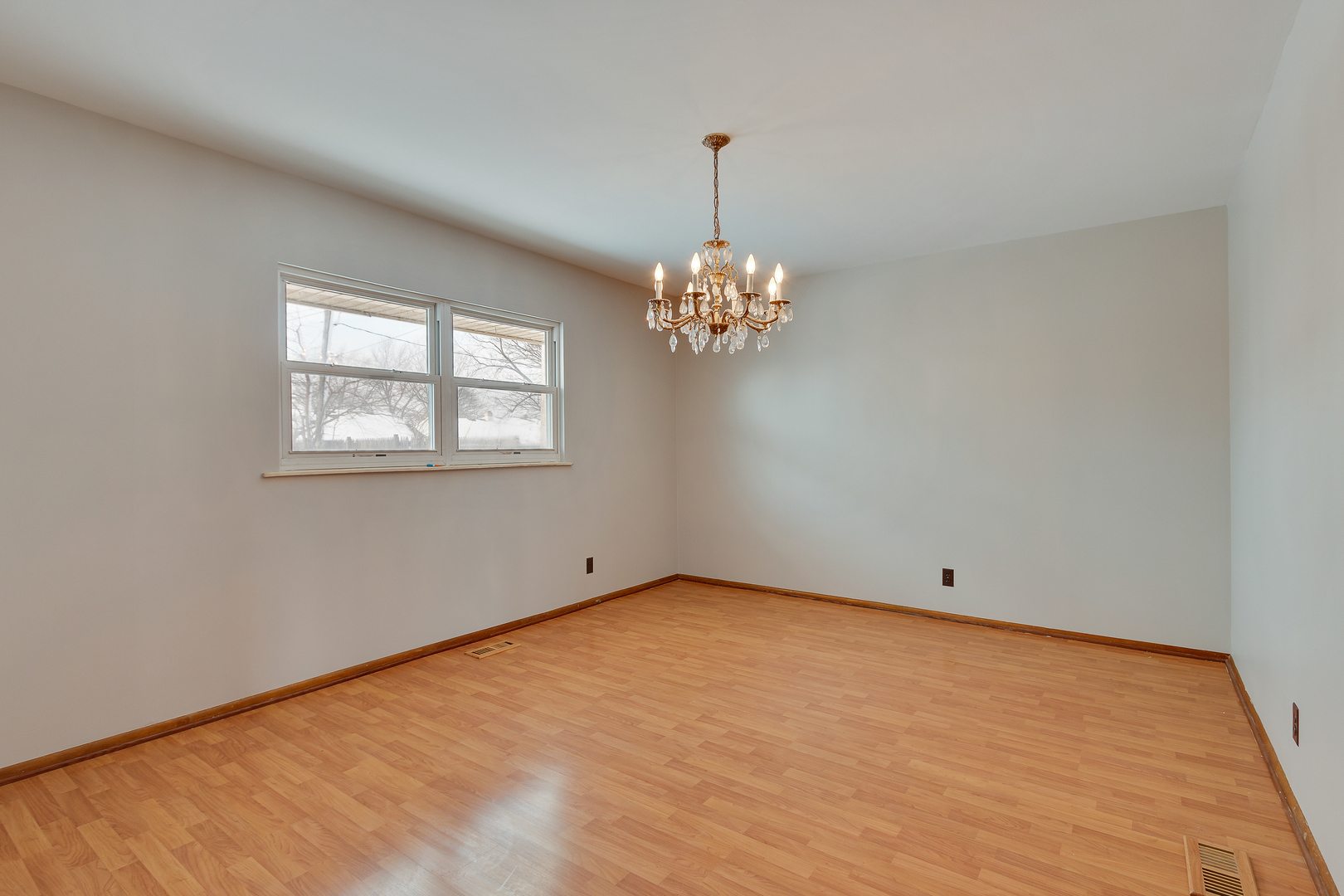1240 Post Road Aurora, IL 60506 - Photo 8 of 15 a view of an empty room with window