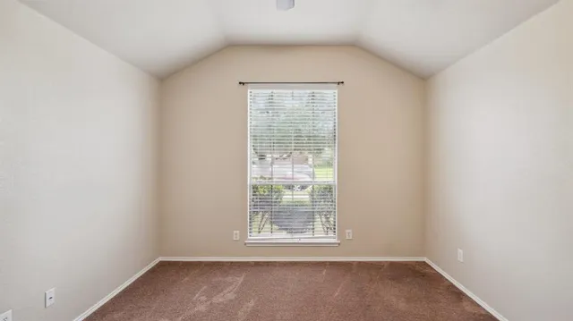 an empty room with a window