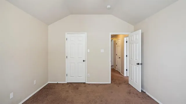 a bathroom with a double vanity sink and mirror
