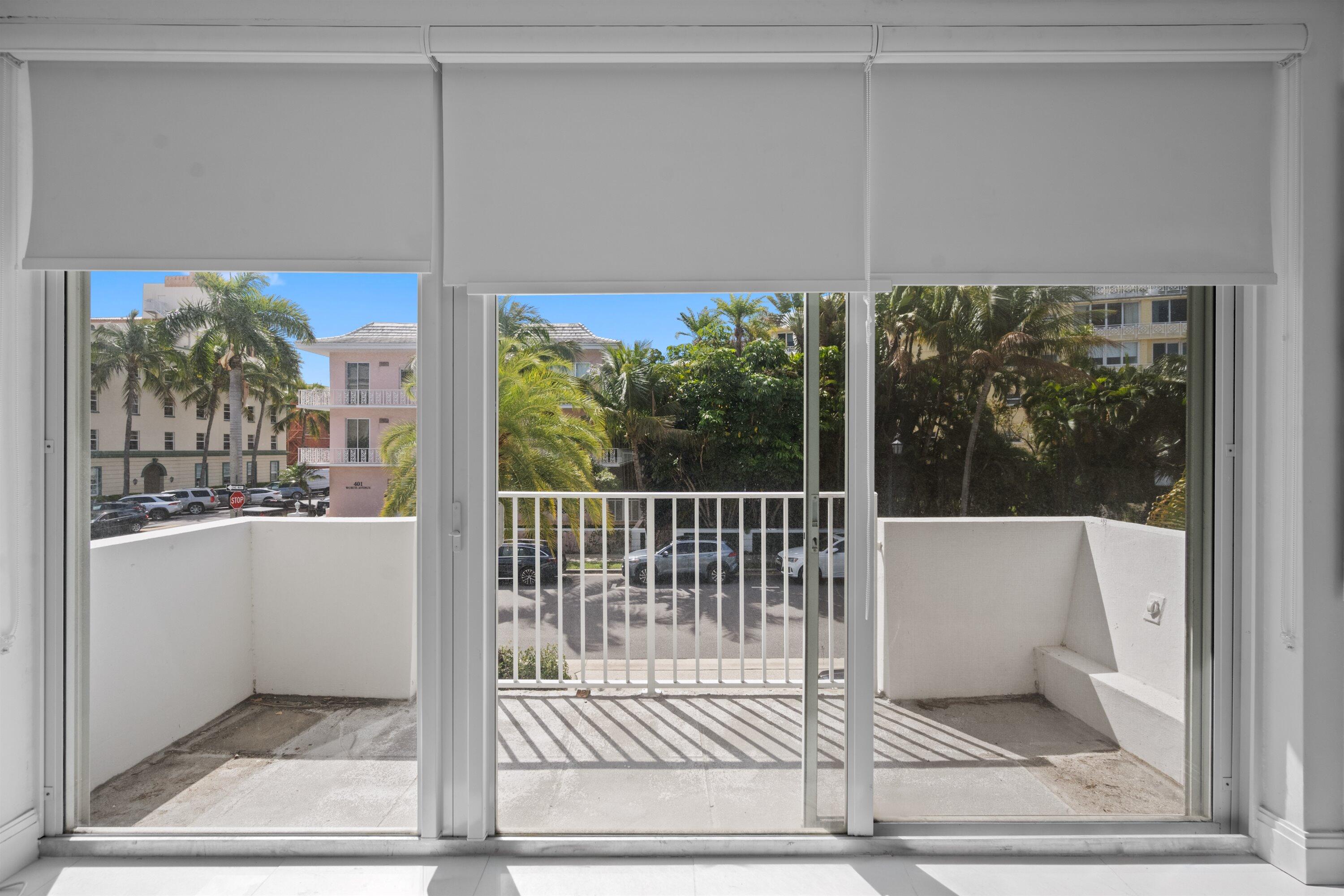401 Peruvian Avenue, Unit 1010 Palm Beach, FL 33480 - Photo 11 of 19 a view of a room with wooden floor and a rug