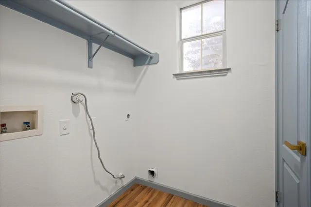 a view of hallway with a window