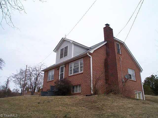 8815 Reynolda Road Pfafftown, NC 27040 - Photo 1 of 9 Exterior Front. Front Side View