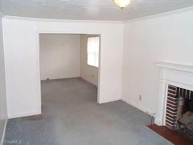 8815 Reynolda Road Pfafftown, NC 27040 - Photo 4 of 9 Other. LivingRm w/FP overlooking Dining Rm