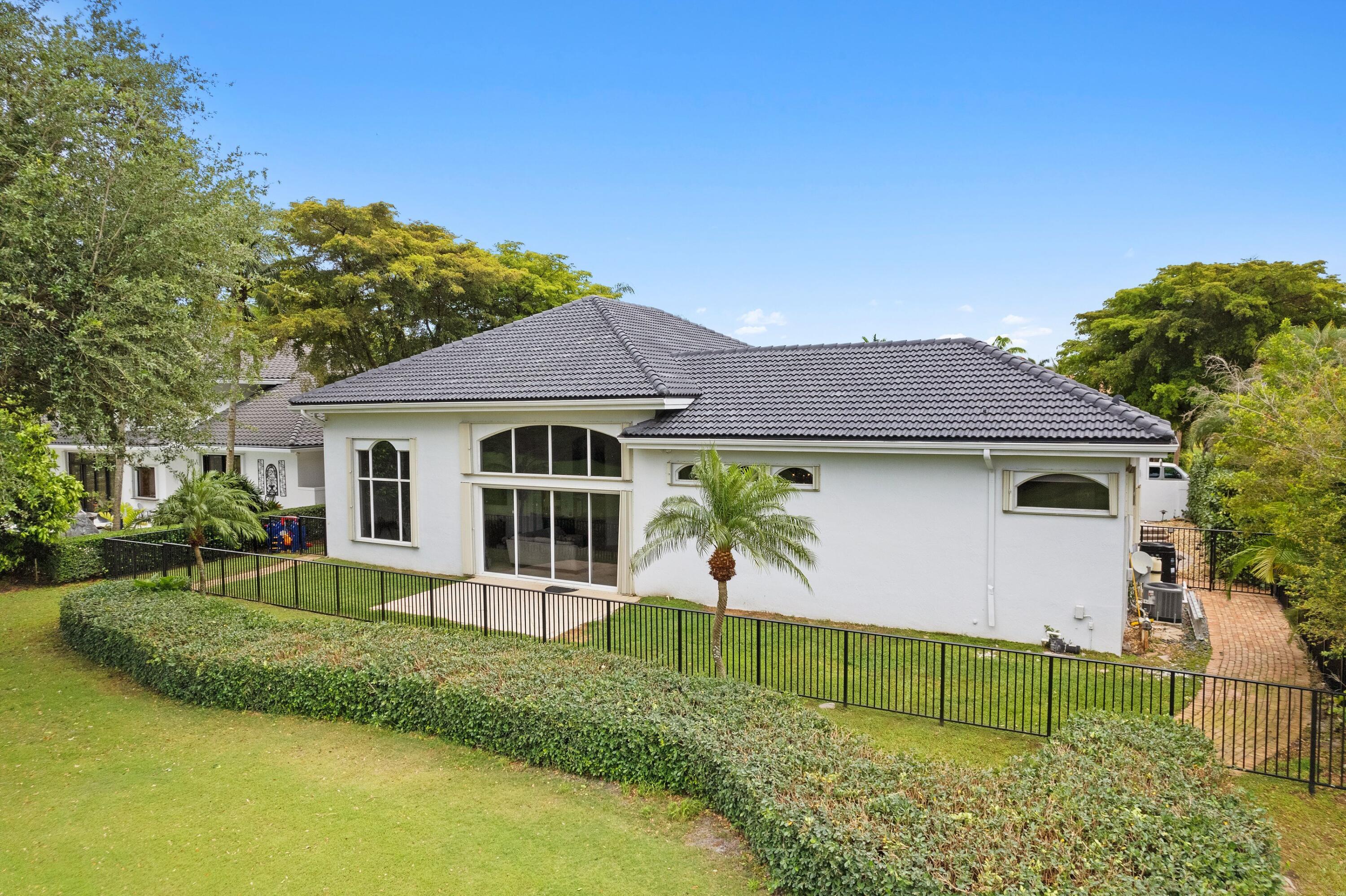 7796 Mandarin Drive Boca Raton, FL 33433 - Photo 27 of 36 Fenced-in Backyard
