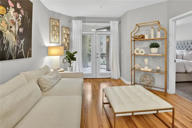 a living room with furniture and a table