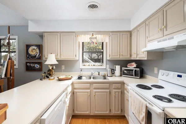 $915,000 | 219 Kitty Hawk Bay Drive, Kill Devil Hills, NC 27948