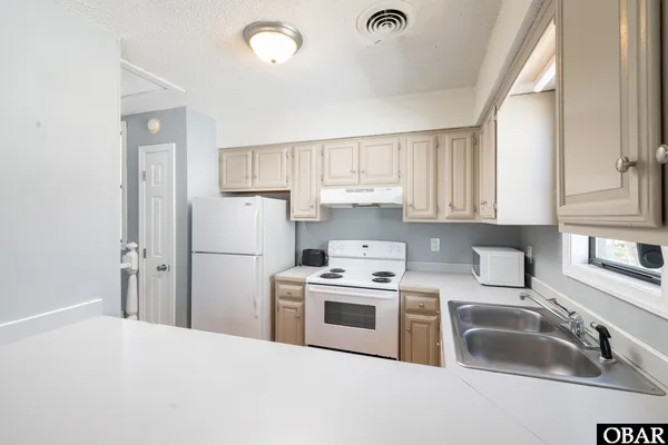 $915,000 | 219 Kitty Hawk Bay Drive, Kill Devil Hills, NC 27948