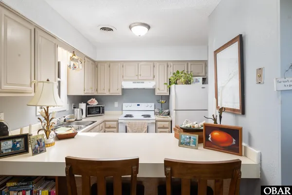 $915,000 | 219 Kitty Hawk Bay Drive, Kill Devil Hills, NC 27948