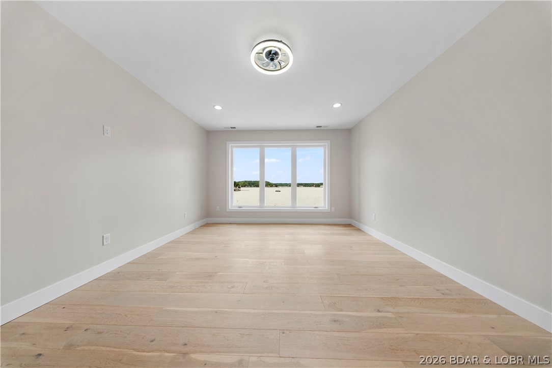 439 Red Bud Road Lake Ozark, MO 65049 - Photo 60 of 98 Large secondary bedroom with clean modern finishes