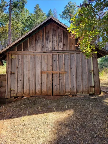 a wooden door in front of a house