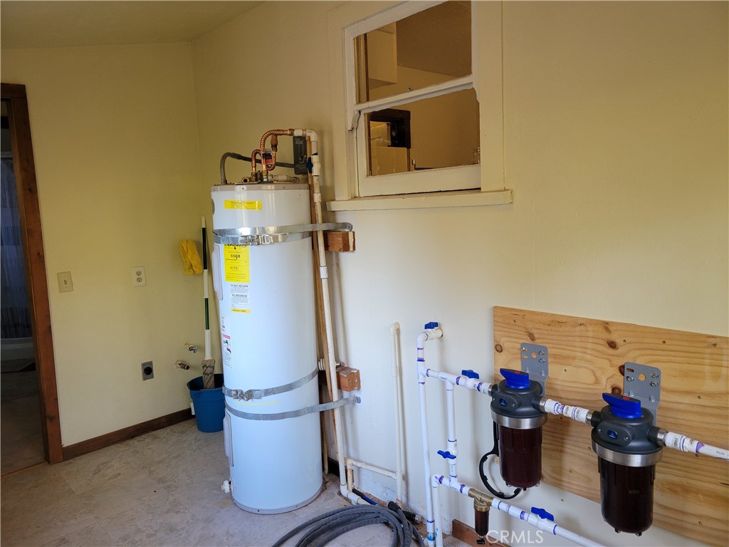 300 Bald Rock Road Berry Creek, CA 95916 - Photo 38 of 45 a view of storage and utility room with a sink