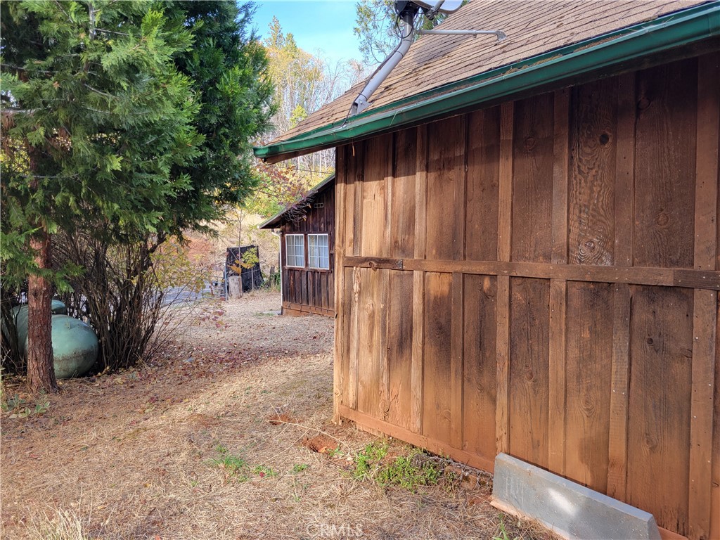 300 Bald Rock Road Berry Creek, CA 95916 - Photo 45 of 45 a backyard of a house with table and chairs