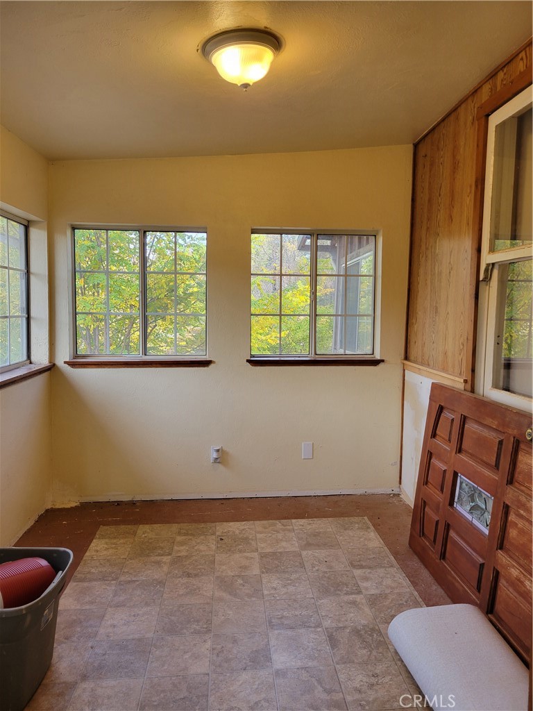 300 Bald Rock Road Berry Creek, CA 95916 - Photo 7 of 45 a view of a room with window and furniture