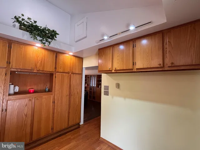 a view of a storage & utility room with wooden floor