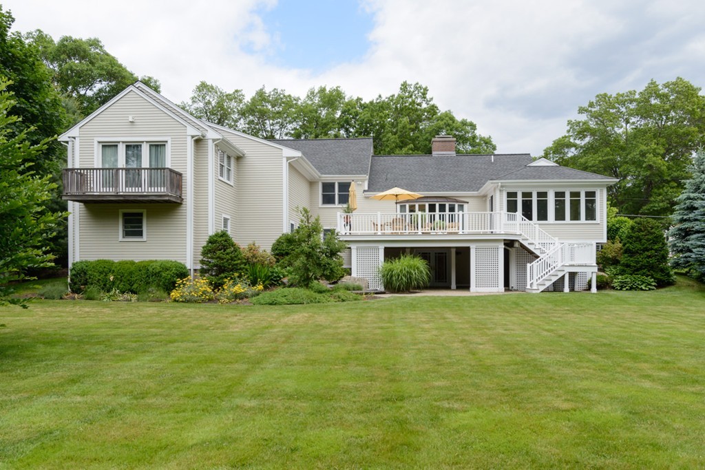 35 Norwich Road Wellesley, MA 02481 - Photo 1 of 25 a front view of a house with a yard