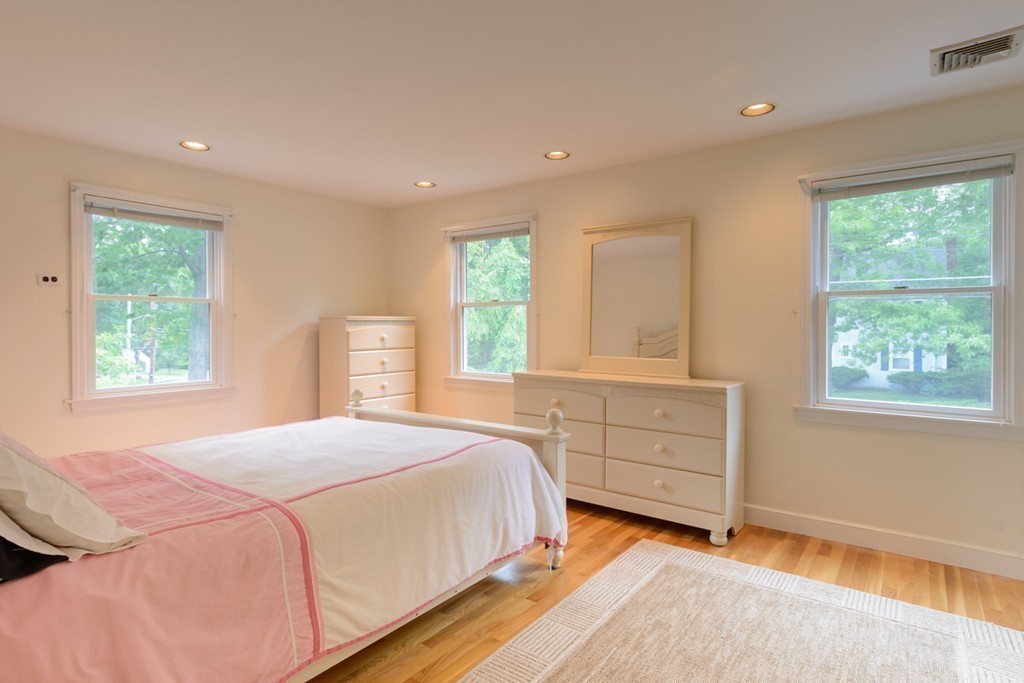 35 Norwich Road Wellesley, MA 02481 - Photo 17 of 25 a bedroom with a bed and a window
