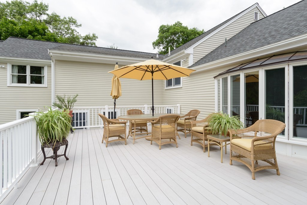35 Norwich Road Wellesley, MA 02481 - Photo 4 of 25 a view of a house with patio and wooden floor