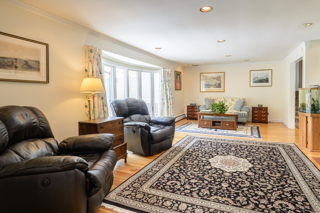 35 Norwich Road Wellesley, MA 02481 - Photo 8 of 25 a living room with furniture and a rug