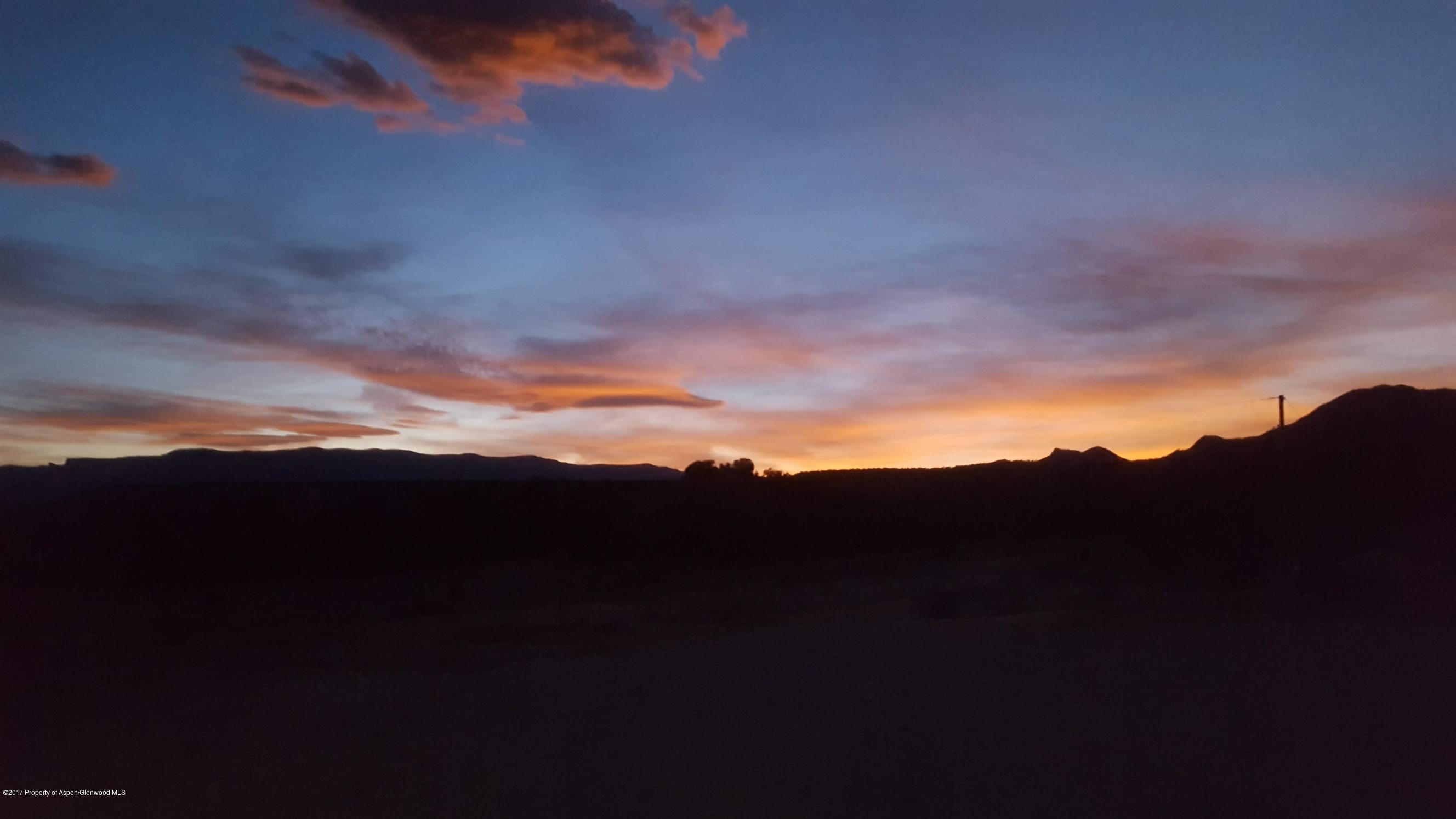 1177 County Road 259 Rifle, CO 81650 - Photo 5 of 9 a view of sunset and a city
