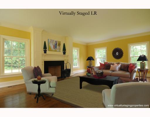 Undisclosed Address Darien, CT 06820 - Photo 4 of 17 a living room with furniture and a fireplace