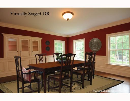 Undisclosed Address Darien, CT 06820 - Photo 5 of 17 a view of a dining room with furniture and chandelier