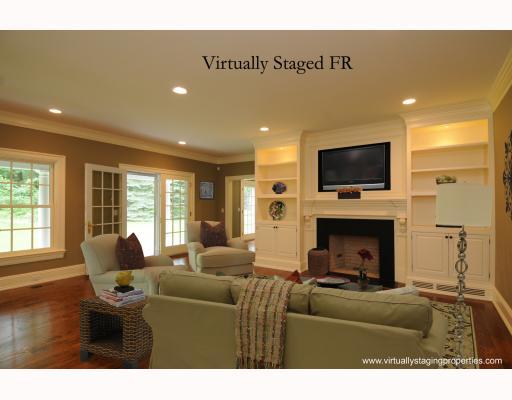 Undisclosed Address Darien, CT 06820 - Photo 10 of 17 a living room with furniture a fireplace and a flat screen tv