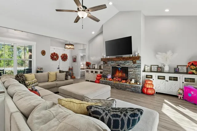 a kitchen with granite countertop a stove and cabinets
