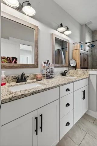 a view of a hallway to room with front door