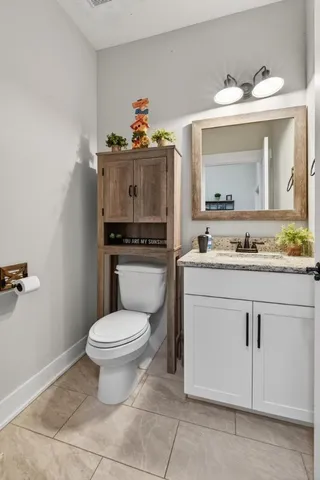a view of a patio with a chairs and table in a patio