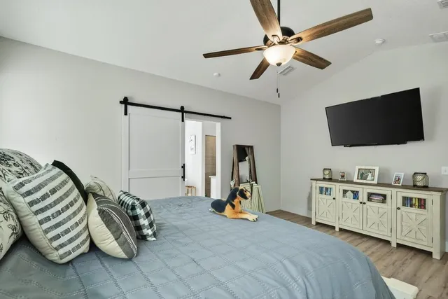 a swimming pool with wooden fence