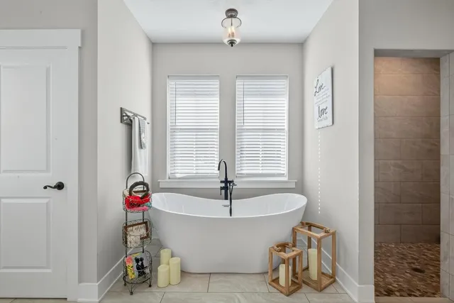 a front view of a house with a yard and porch