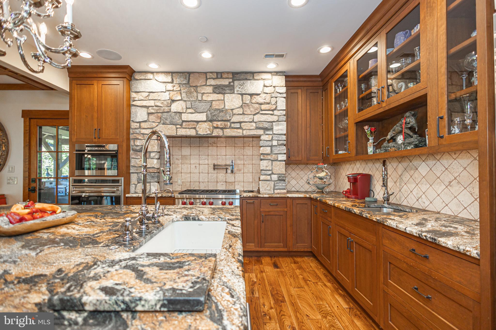 992 A Worthington Mill Road Newtown, PA 18940 - Photo 24 of 96 a kitchen with stainless steel appliances kitchen island granite countertop a sink and cabinets