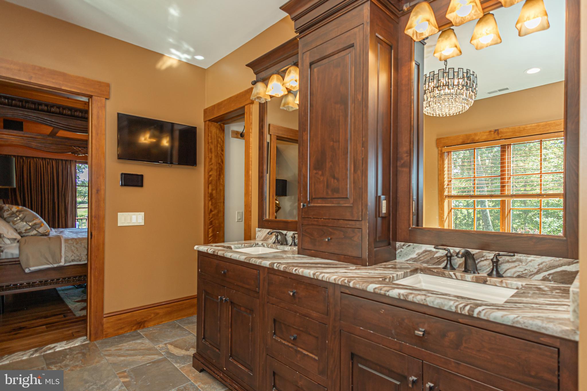992 A Worthington Mill Road Newtown, PA 18940 - Photo 40 of 96 a bathroom with a granite countertop sink and a large mirror