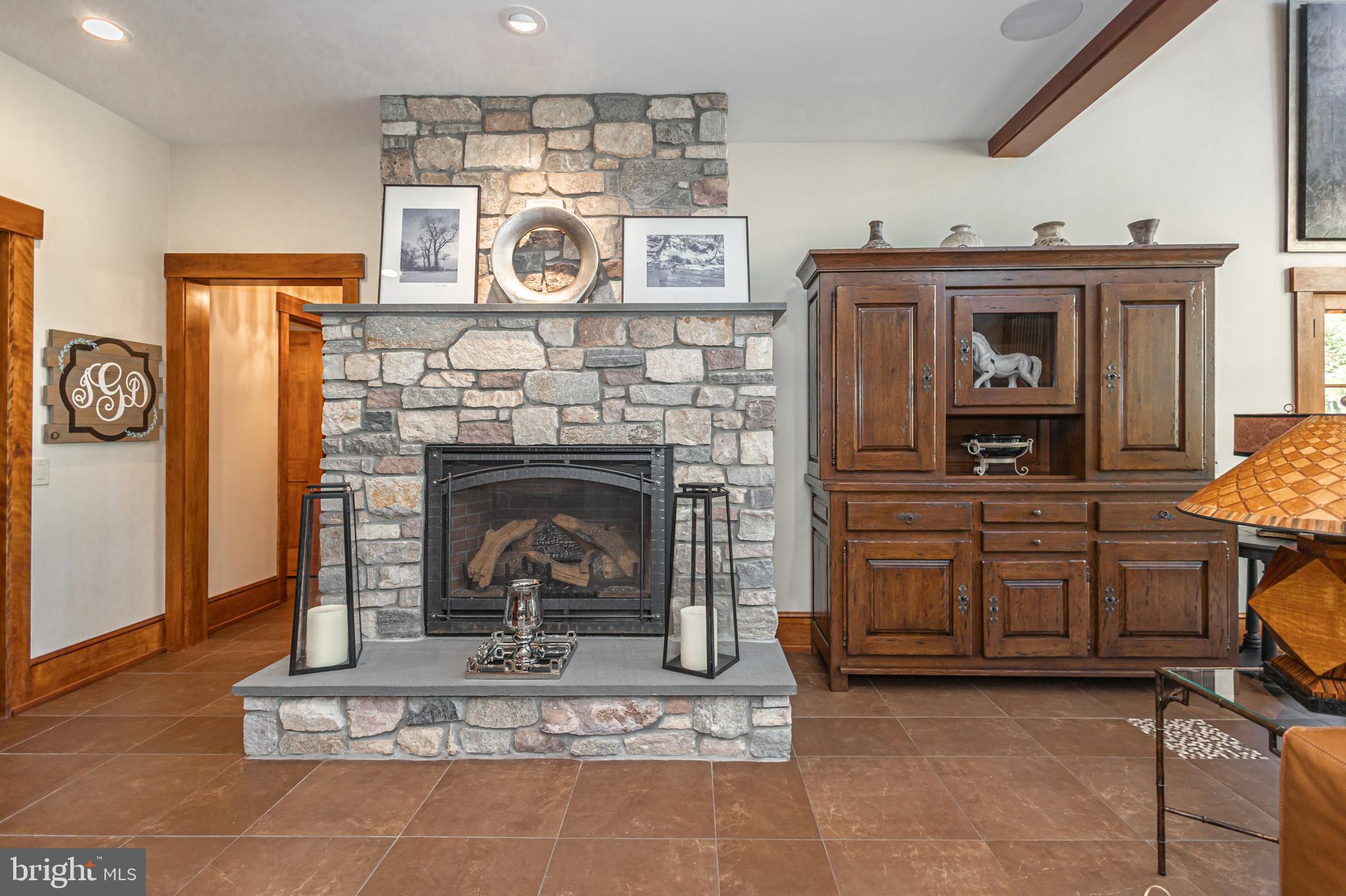 992 A Worthington Mill Road Newtown, PA 18940 - Photo 56 of 96 a living room with furniture and a fireplace