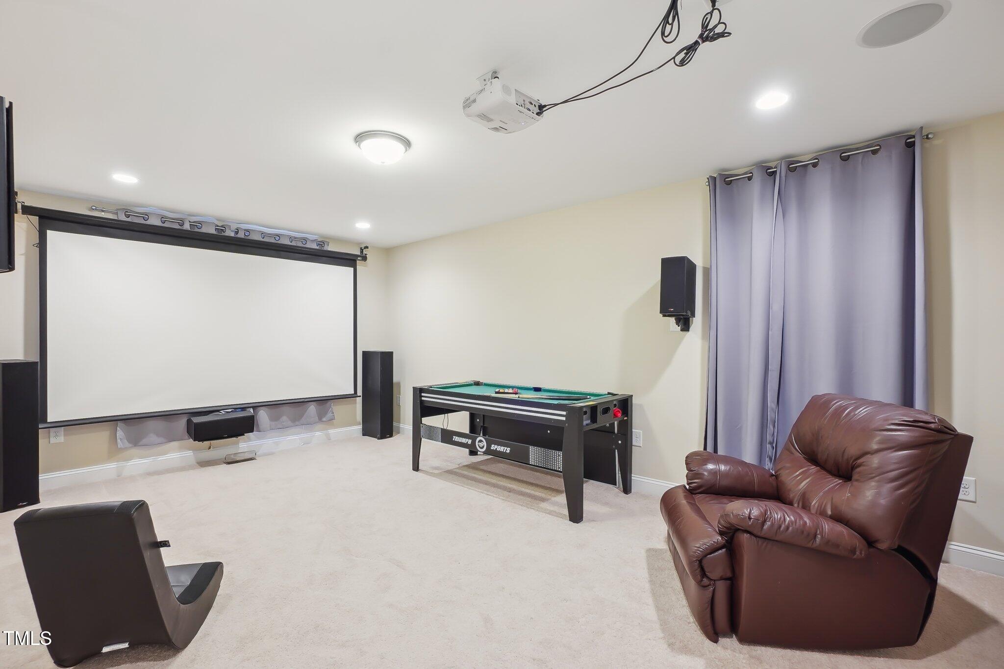 4008 Sykes Street Cary, NC 27519 - Photo 23 of 41 a projector room with furniture