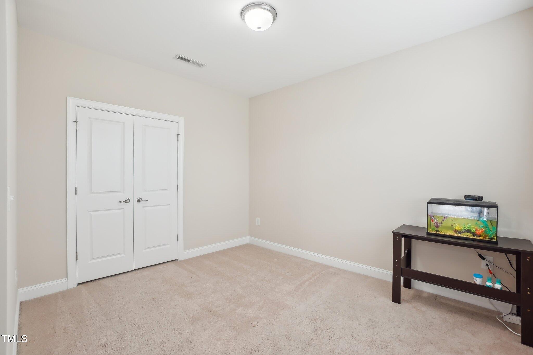 4008 Sykes Street Cary, NC 27519 - Photo 25 of 41 a view of room with workspace