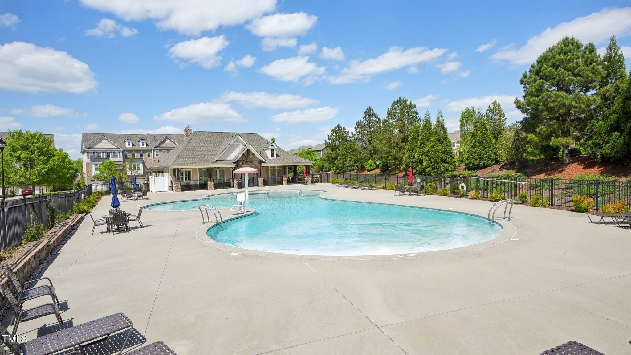4008 Sykes Street Cary, NC 27519 - Photo 33 of 41 a view of a swimming pool with a yard