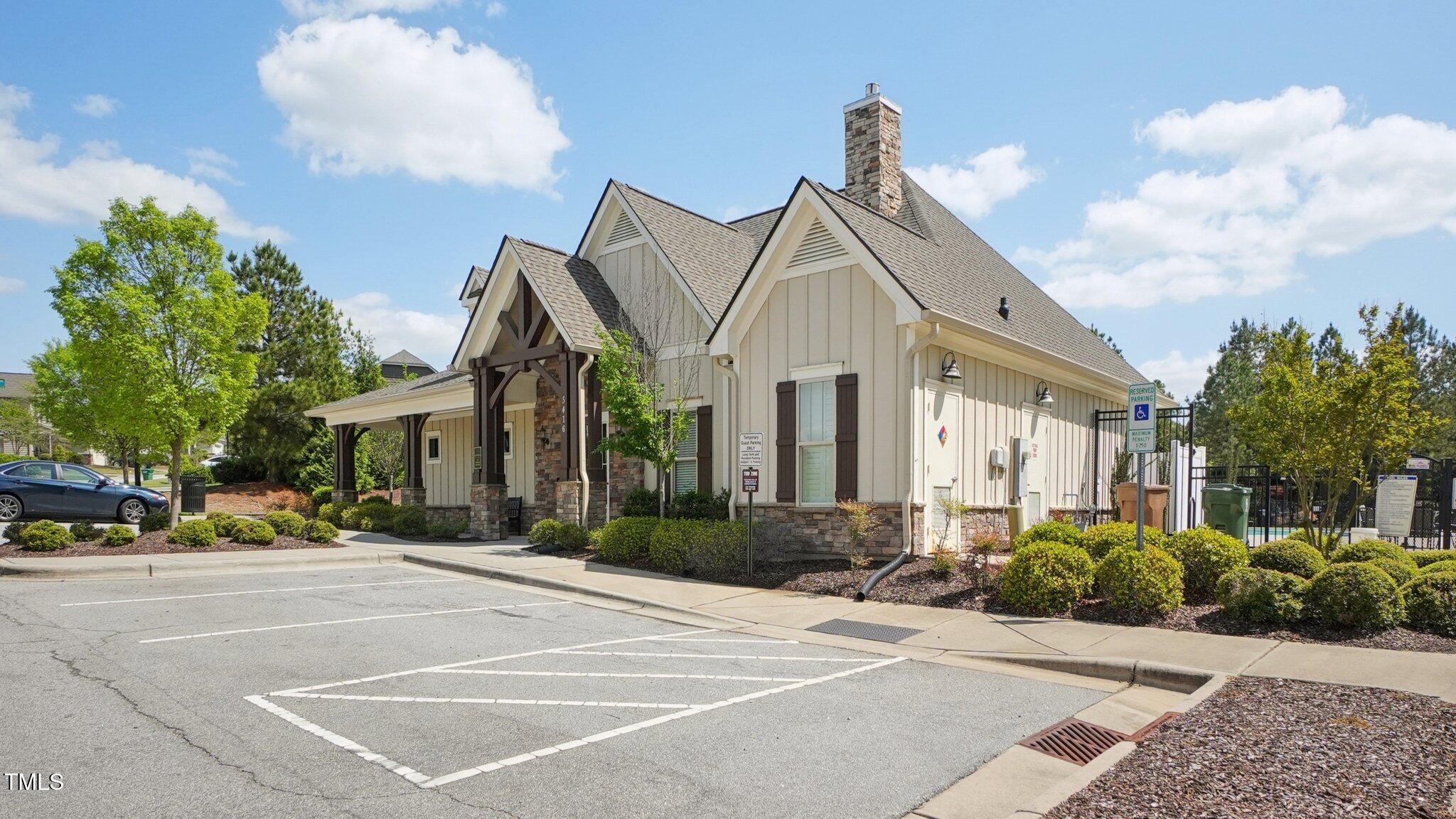 4008 Sykes Street Cary, NC 27519 - Photo 34 of 41 a front view of a house with a yard