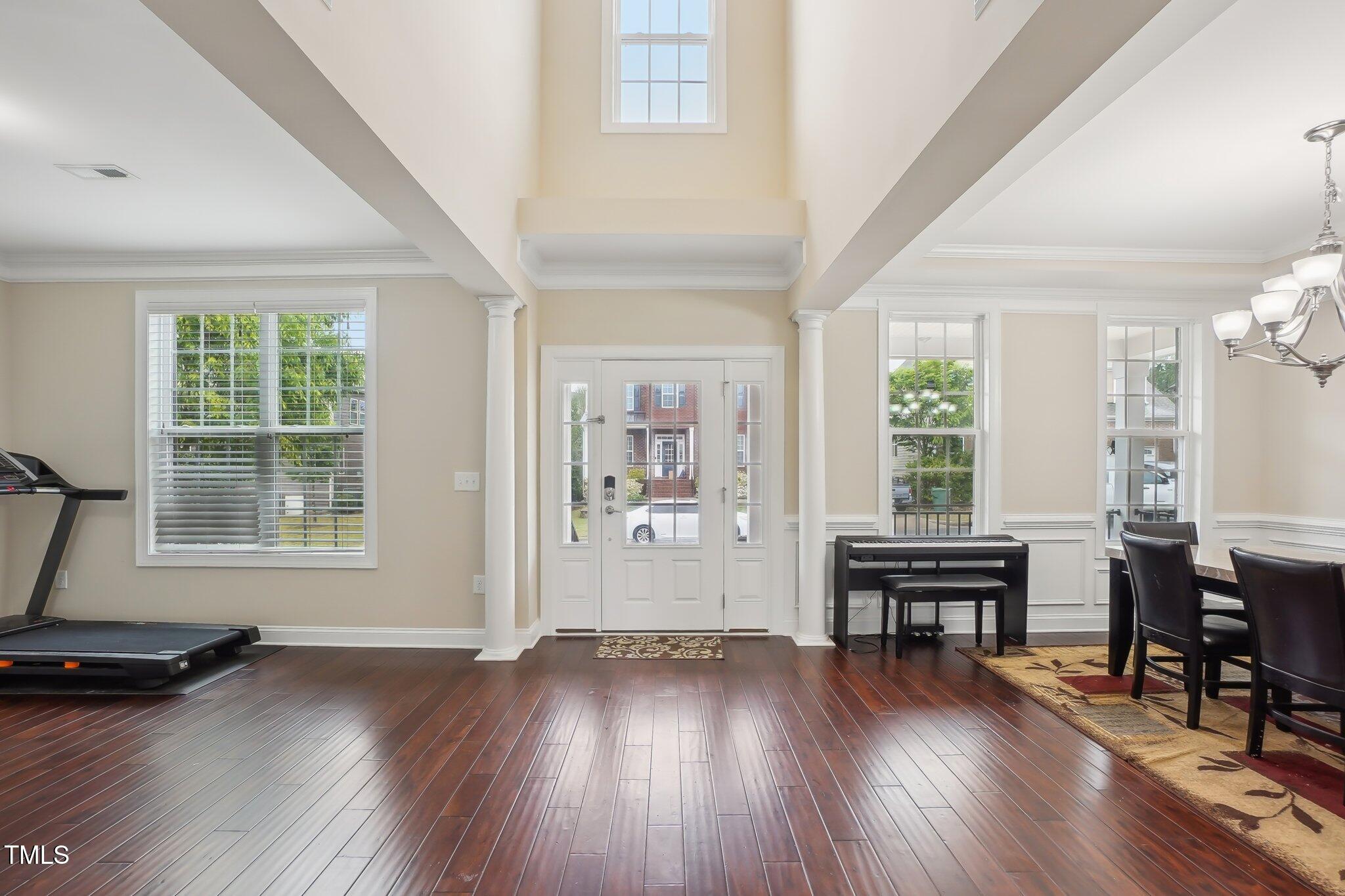 4008 Sykes Street Cary, NC 27519 - Photo 4 of 41 wooden floor in an empty room with a window
