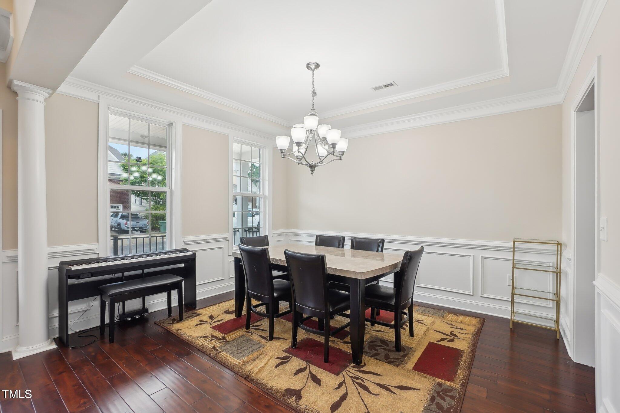 4008 Sykes Street Cary, NC 27519 - Photo 5 of 41 a view of a dining room with furniture window and wooden floor