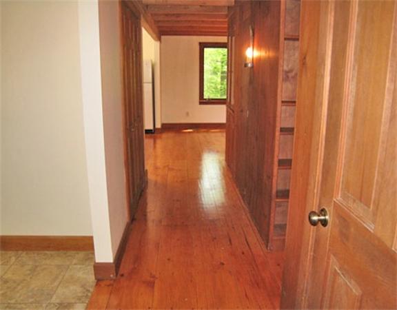 488 White Road Warwick, MA 01378 - Photo 19 of 30 a view of a hallway with wooden floor