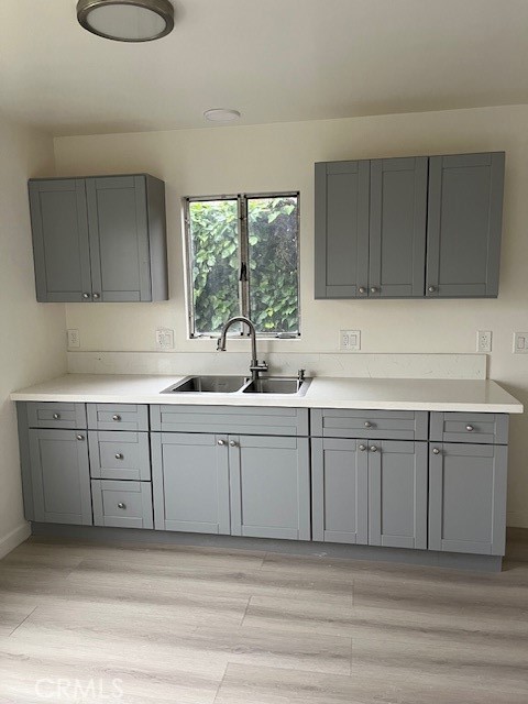 7212 South La Cienega Boulevard Inglewood, CA 90302 - Photo 4 of 8 a kitchen with sink cabinets and window