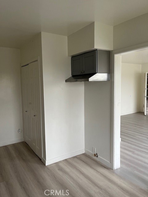 7212 South La Cienega Boulevard Inglewood, CA 90302 - Photo 5 of 8 a view of a kitchen with wooden floor