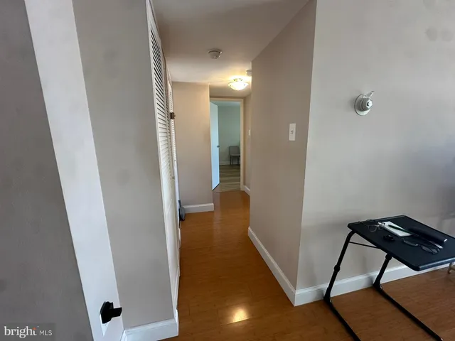 a kitchen with a sink and a stove top oven