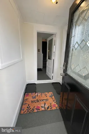 a room with furniture and wooden floor
