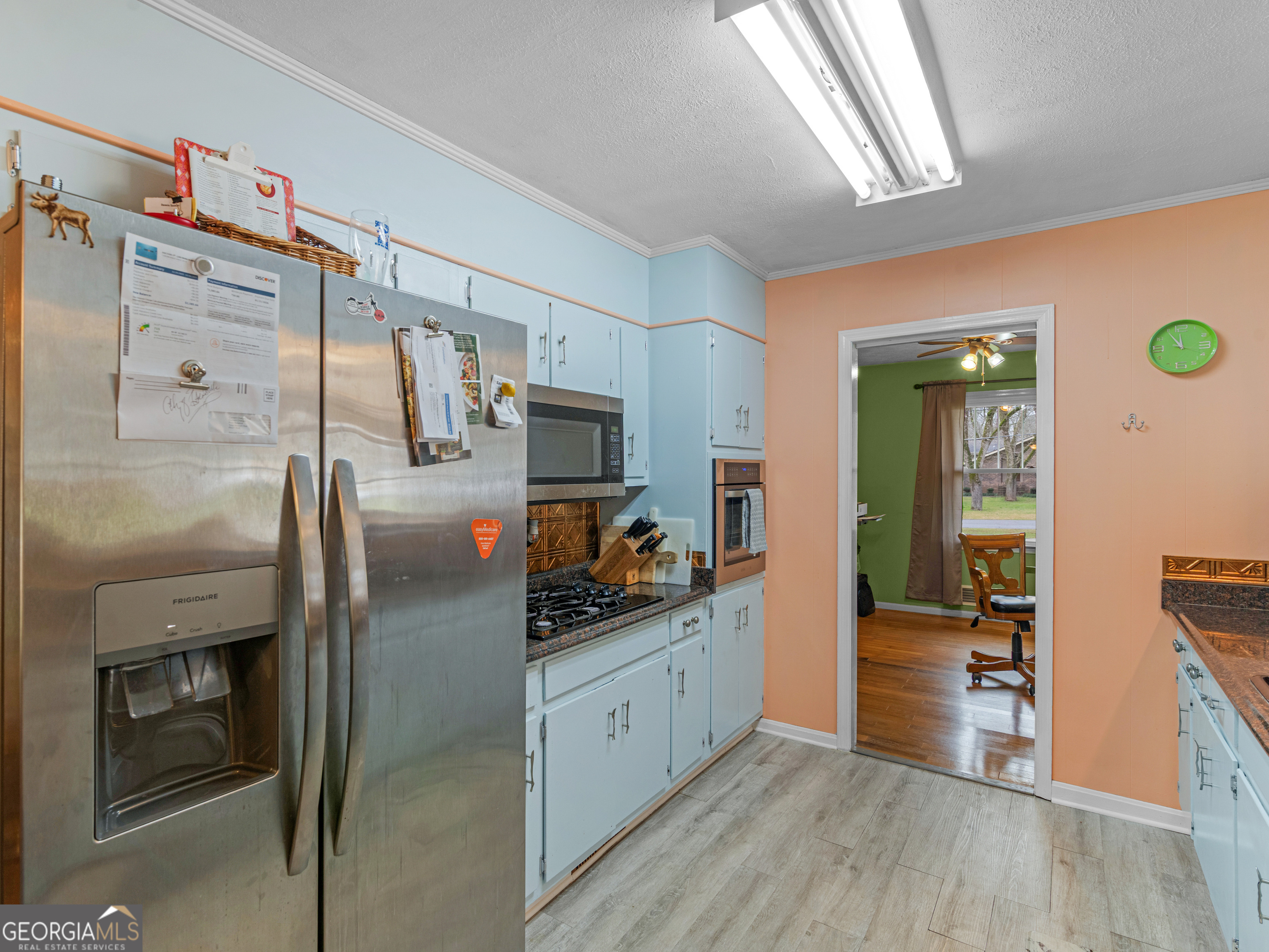 329 Pine Street Barnesville, GA 30204 - Photo 20 of 57 a kitchen with stainless steel appliances a refrigerator and a stove