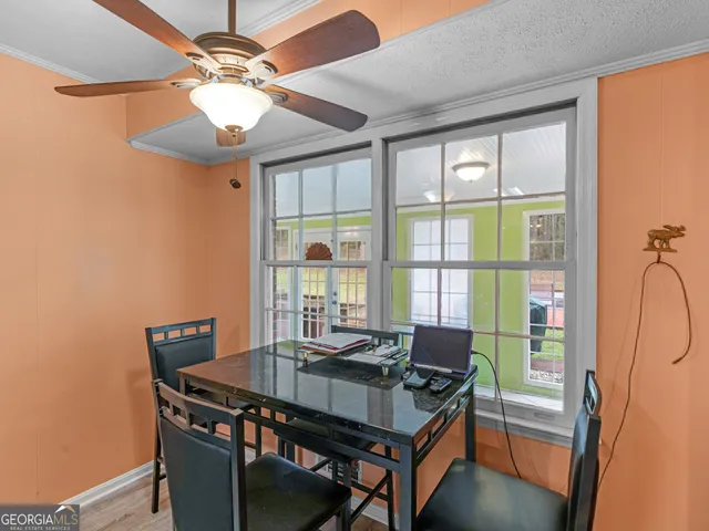 a room with furniture and a flat screen tv