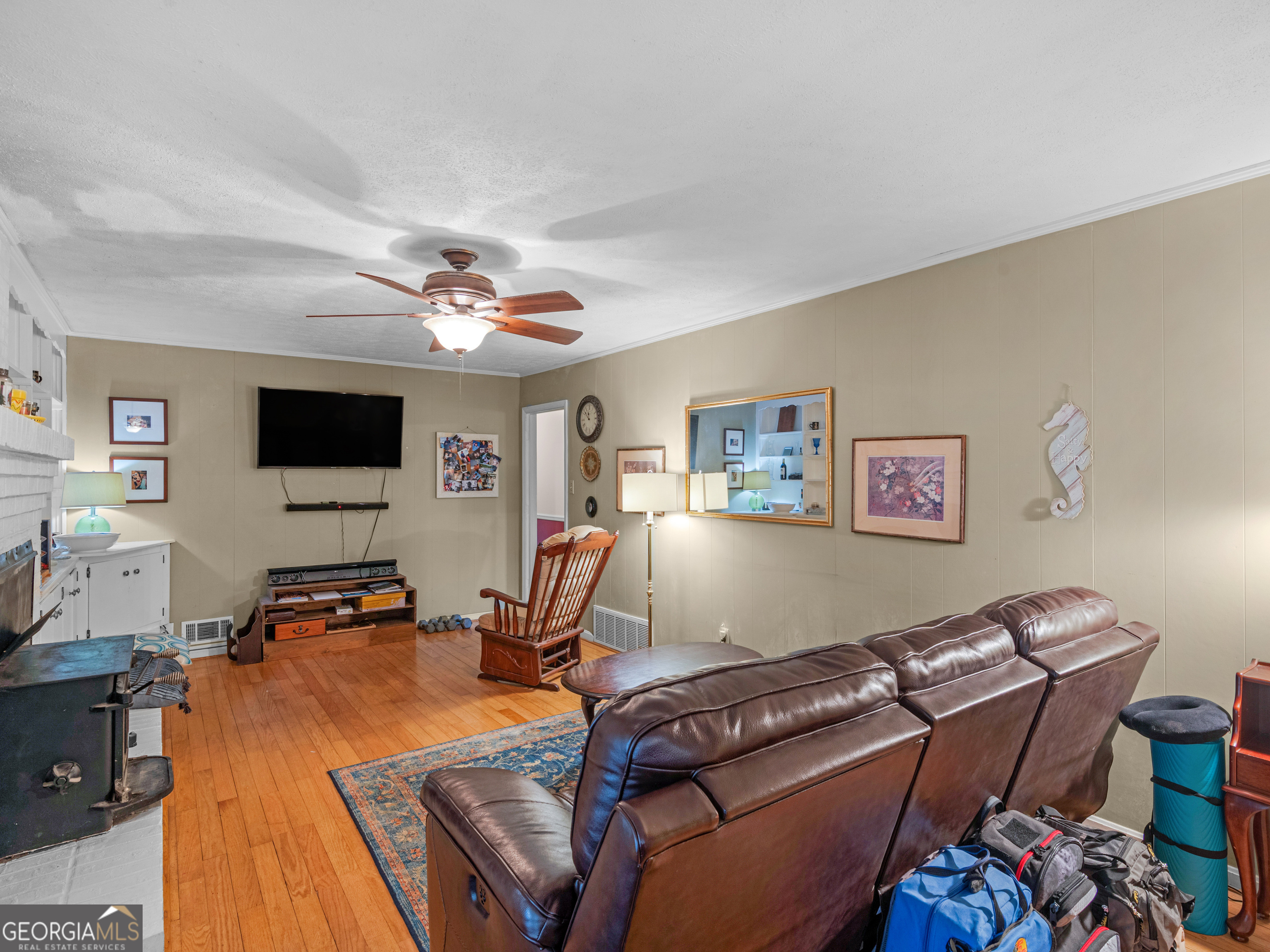 329 Pine Street Barnesville, GA 30204 - Photo 27 of 57 a room with furniture and a flat screen tv