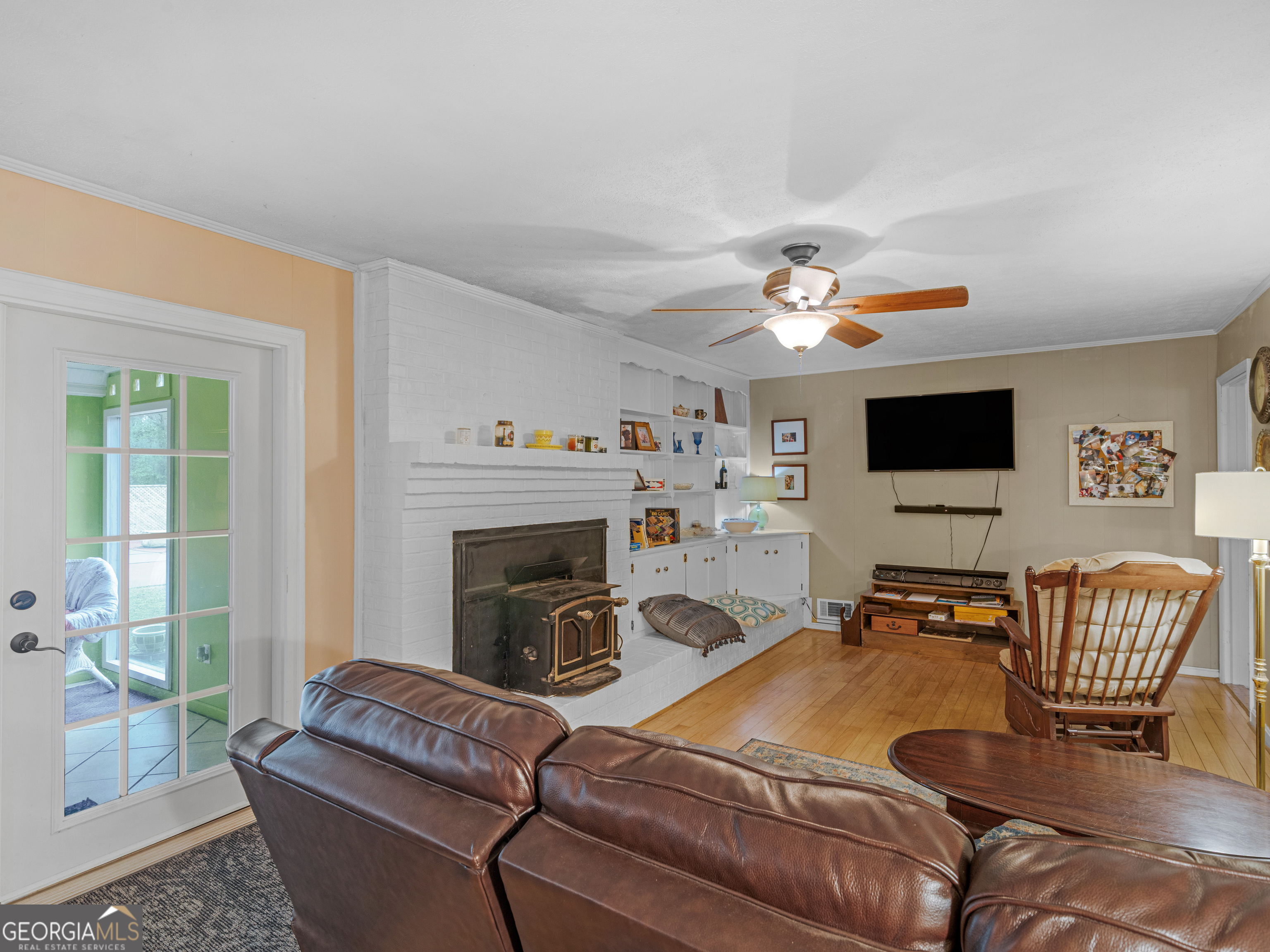 329 Pine Street Barnesville, GA 30204 - Photo 28 of 57 a living room with furniture and a flat screen tv