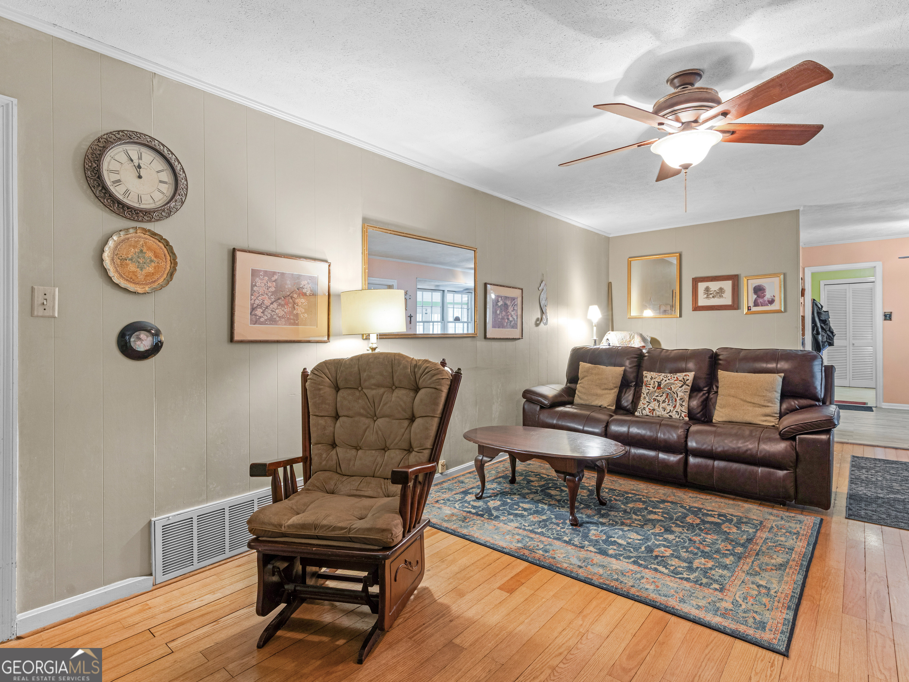 329 Pine Street Barnesville, GA 30204 - Photo 30 of 57 a living room with furniture and wooden floor